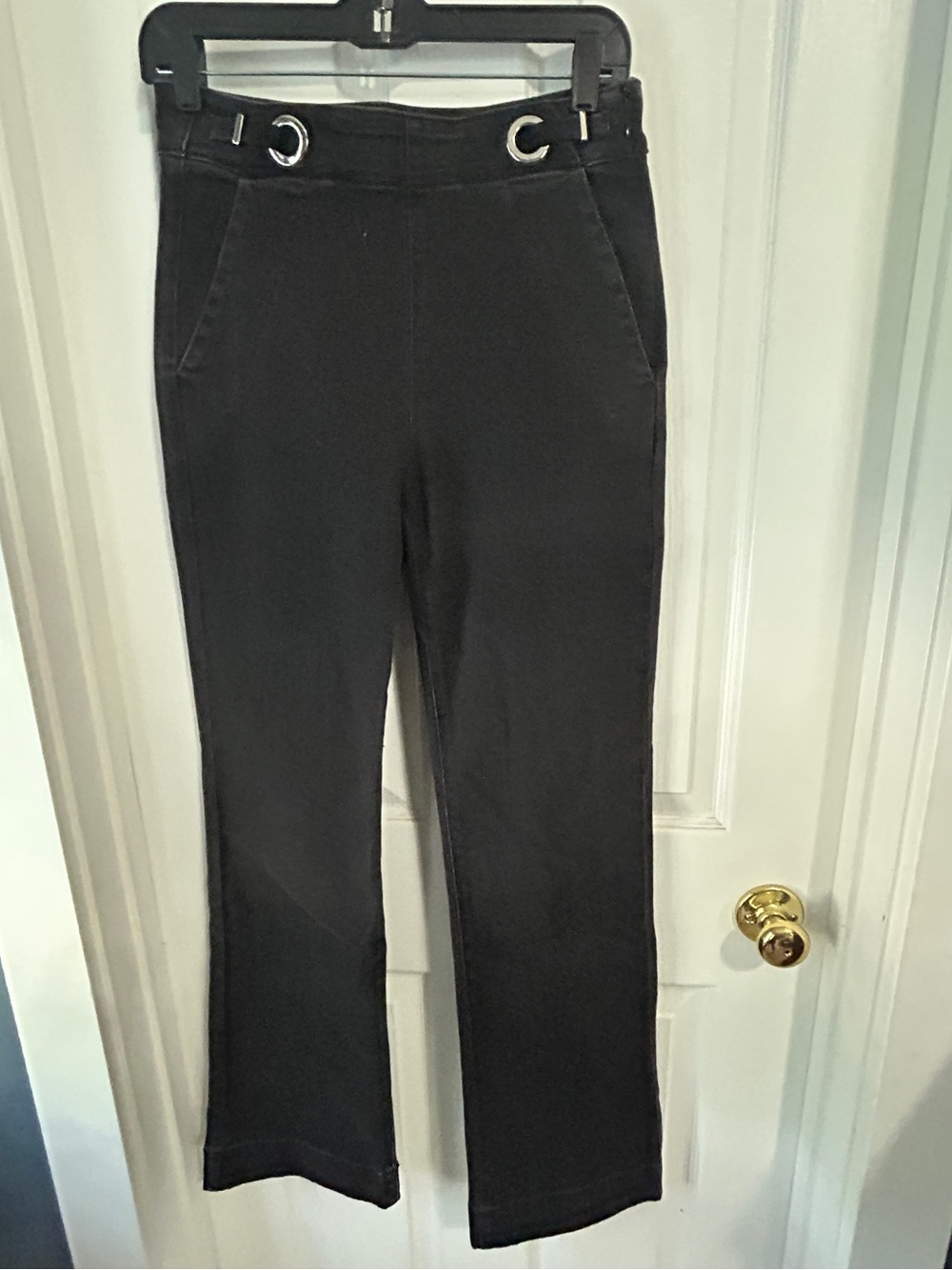 White House Black Market Black Flare Jeans with Grommet Detail
